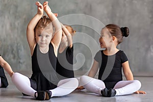 Girls stretch before a ballet