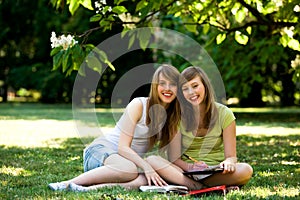 Girls studying outdoors