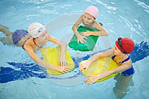 Girls swimming in pool