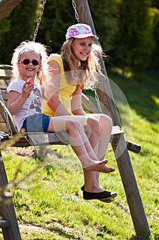 Girls on swing