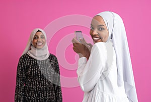 Girls taking self portrait