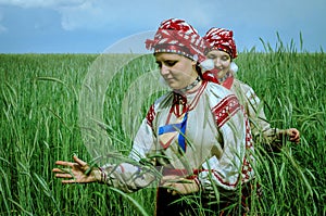 Girls in traditional Belarusian folk costumes for the rite in the Gomel region of Belarus.