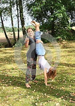 Girls training handstand