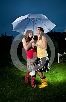 Girls under umbrella