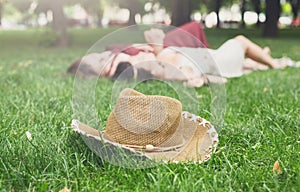 Girls unfocused relax in summer park, young hippie friends leisure