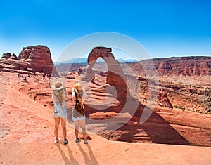 Girls on vacation hiking trip in Utah.