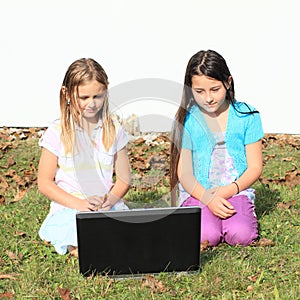 Girls watching notebook