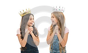 Girls wear crowns. Spoiled children concept. Egocentric princess. Kids wear golden crowns symbol princess. Every girl photo