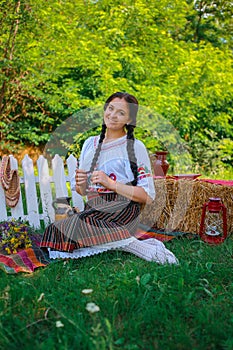 Girls wearing traditional costume in Moldova.