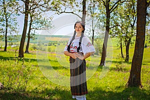 Girls wearing traditional costume in Moldova.