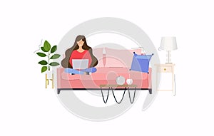 Girls working at home. Young woman sitting on a sofa and using laptop. Freelance, self employed, freedom, in living room