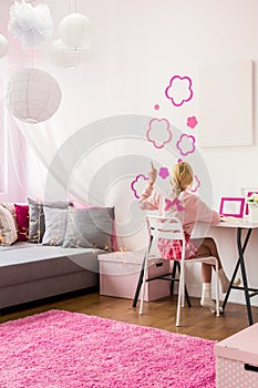 Girly bedroom with wall decoration photo