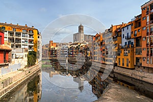 Girona skyline, cathedral and colorful houses along the Onyar river in the downtown, Catalonia, Spain