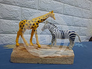 The girrafe and zebra miniatures