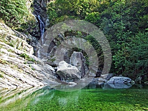 Giumaglio`s waterfall or La cascata di Giumaglio in Vallemaggia, Magic Valley or Valle Magia Valle Maggia photo