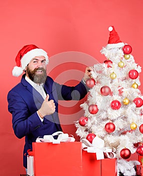 Give big cheer for New Year. Santa bearded man decorating christmas tree. Balls ornaments and decorative accessories