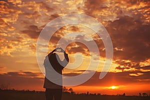 Give the gift on the Day of LoveRomantic girl walking in a field in sunset light. Winter, autumn life