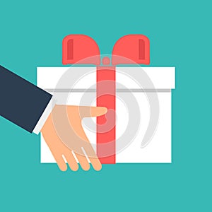 Give gift. Man holds white gift box with a red ribbon in hands. Giving, receiving surprise.