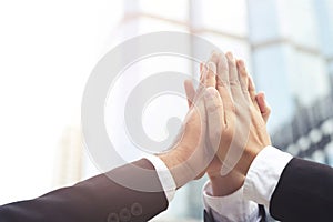 Give me five your clap hands articulate group businessman for good business team. concept Success and encouragement to overcome
