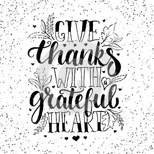 Give thanks with a greatful heart - Thanksgiving day lettering calligraphy phrase with leaves and hearts. Autumn