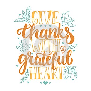 Give thanks with a greatful heart - Thanksgiving day lettering calligraphy phrase with leaves and hearts. Autumn