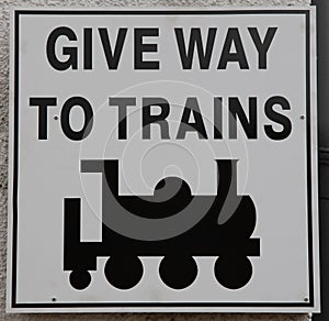 Give Way to Trains Sign