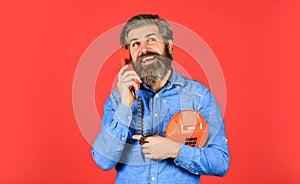 Give your brand the due attention. young man talking on telephone. senior hipster old telephone. brutal guy with