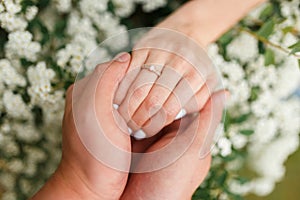 He gives his girlfriend an engagement ring in the botanical garden