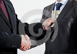 Giving a bribe into a pocket