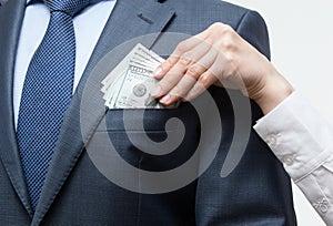 Giving a bribe into a pocket