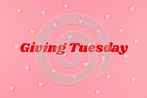 Giving Tuesday concept on pink background