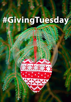 Giving Tuesday concept with red knitted heart