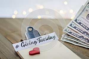 Giving Tuesday donate charity concept with text on wooden board