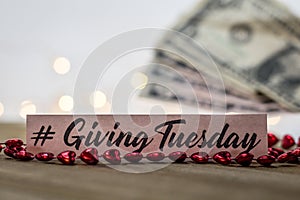 Giving Tuesday donate charity concept with text on wooden board