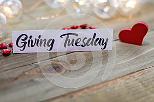 Giving Tuesday donate charity concept with text on wooden board