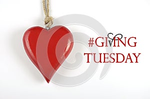 #Giving Tuesday with red heart on white photo