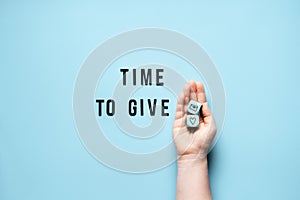 Giving Tuesday, Time to Give, Help, Donation, Support, Volunteer concept with red heart and text Time to Give on blue