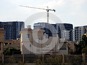 Giza, Egypt, March 15 2024: A construction site of new high rise in Egypt by Orascom construction Zed city Sheikh Zayed, new real photo