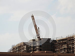 Giza, Egypt, March 15 2024: A construction site of new high rise in Egypt by Orascom construction Zed city Sheikh Zayed, new real photo