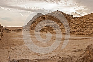 The giza plateau in the sahara desert. great pyramids