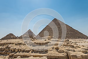 The Giza pyramid complex, an archaeological site on the Giza Plateau, on the outskirts of Cairo, Egypt. It includes the three