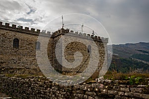 GJIROKASTRA, ALBANIA: View of the old fortress and walls in Gjirokastra.