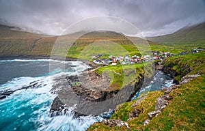 Gjogv gorge and town on the island of Eysturoy in the Faroe Islands. Long exposure photo