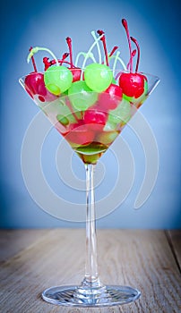Glace cherries in martini glass