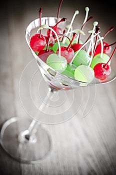 Glace cherries in martini glass