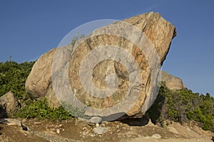 Glacial boulder in gravel on Hammonasset Beach, Connecticut.