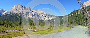 Rocky Mountain Landscape with Glacial River and High Mountain Peaks at Emerald Lake, Yoho National Park, British Columbia, Canada