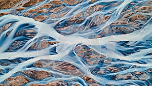 A glacial rivers from above. Aerial photograph of the river streams from Icelandic glaciers. Beautiful art of the Mother nature