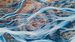 A glacial rivers from above. Aerial photograph of the river streams from Icelandic glaciers. Beautiful art of the Mother nature