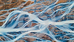 A glacial rivers from above. Aerial photograph of the river streams from Icelandic glaciers. Beautiful art of the Mother nature